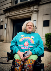 ADAPTer in wheelchair outside of the Capitol Police Headquarters.