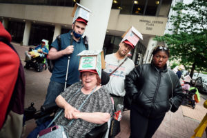 Group of ADAPTers in front of the Federal Center Plaza Building